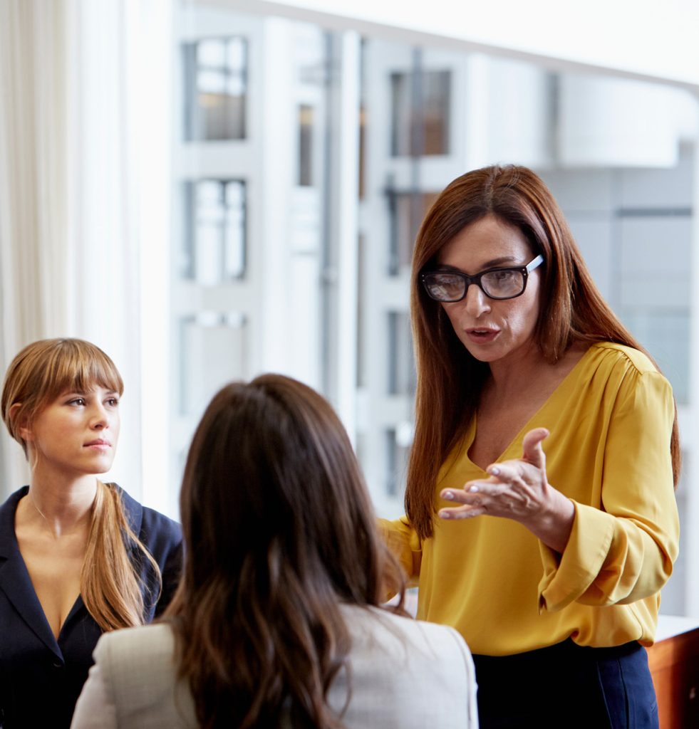 Employees engaged in conversation