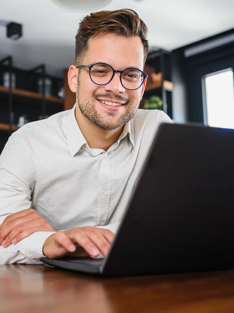 Employee sitting at laptop