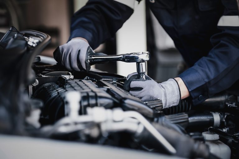 Mechanic working on car