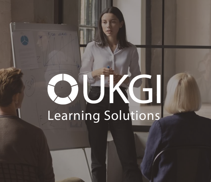 UKGI learning solutions white logo with presentation background
